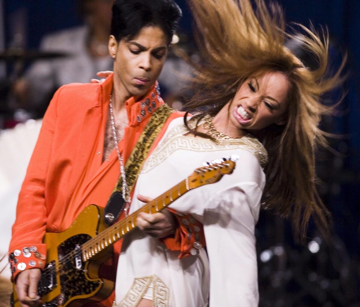 Prince, in 2007, will headline the 2014 Essence Music Festival in New Orleans.