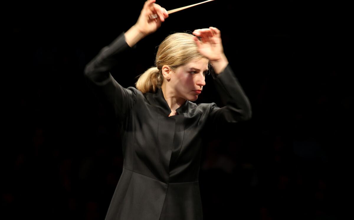 Karina Canellakis leads the Los Angeles Philharmonic at the Hollywood Bowl on Tuesday.