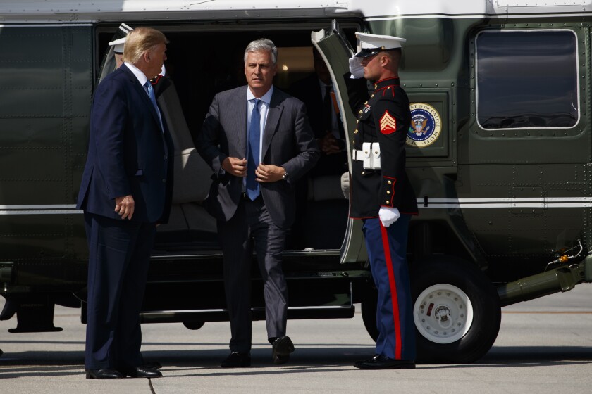President Trump and national security advisor Robert O’Brien at Los Angeles International Airport in September.