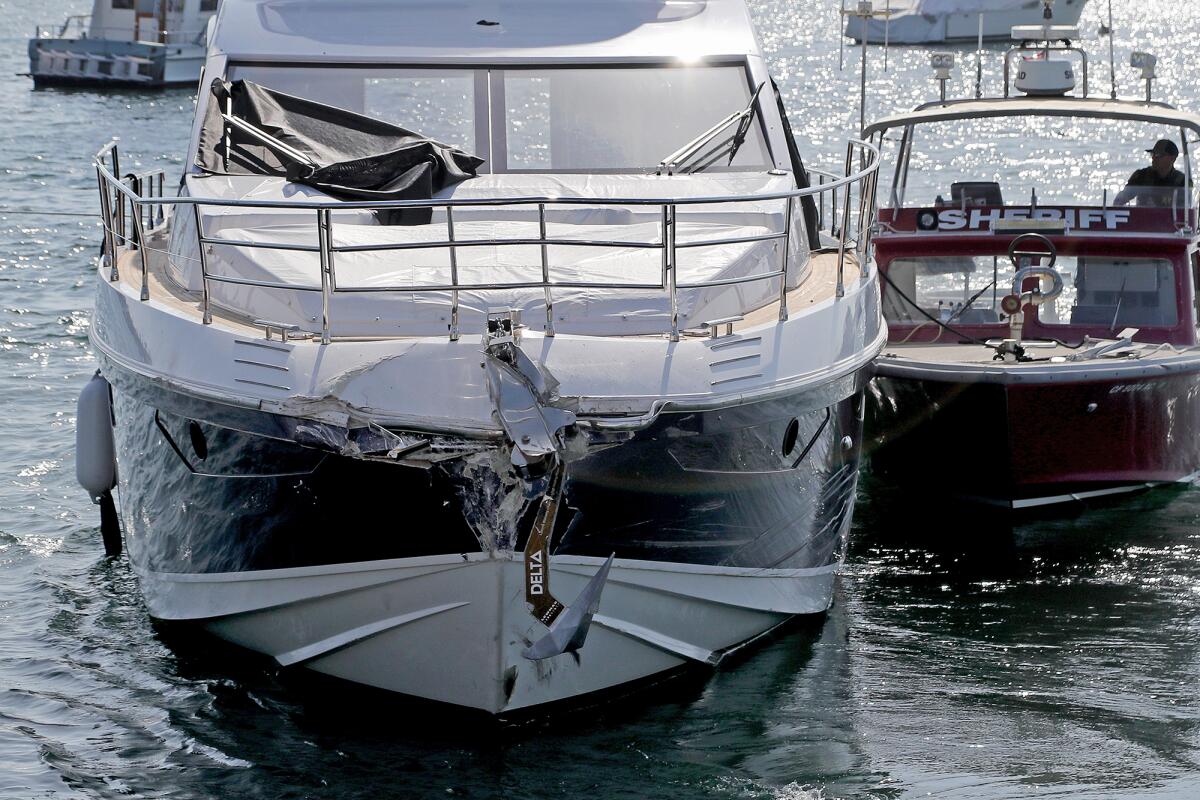 A 60-foot yacht that was stolen and crashed into other boats docked at A'maree's in Newport Harbor.