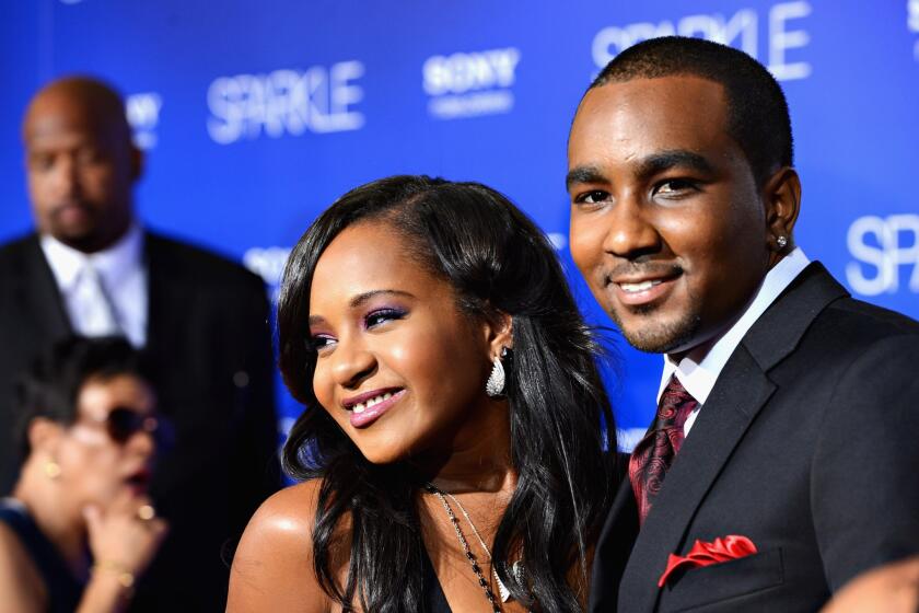 Bobbi Kristina Houston Brown is pictured with Nick Gordon at the Aug. 16, 2012, premiere of "Sparkle" at the Chinese Theatre in Hollywood.