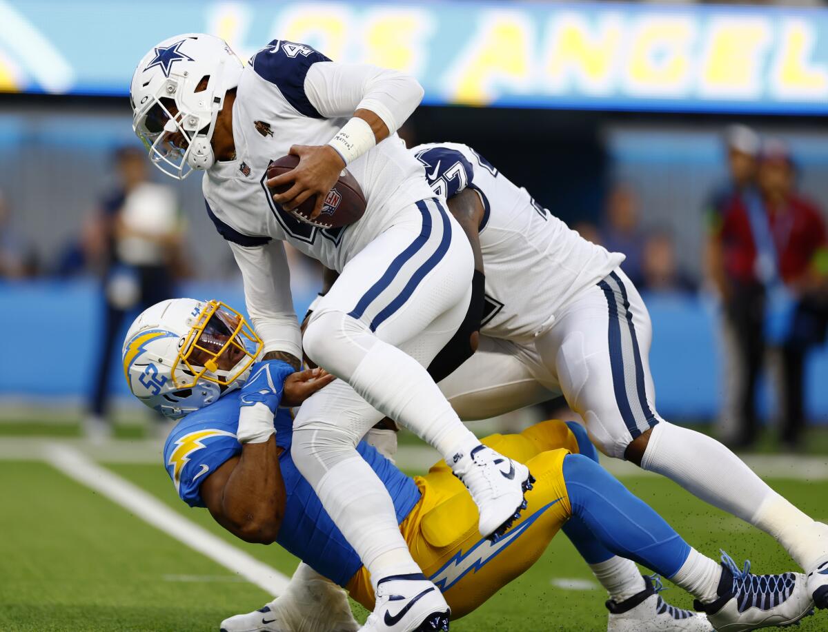 Chargers linebacker Khalil Mack sacks Dallas Cowboys quarterback Dak Prescott in the first quarter.