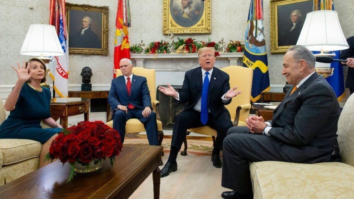 House Minority Leader Nancy Pelosi (D-San Francisco), Vice President Mike Pence, President Trump and Senate Minority Leader Charles E. Schumer (D-N.Y.) at an Oval Office meeting to discuss preventing a government shutdown on Dec. 11.