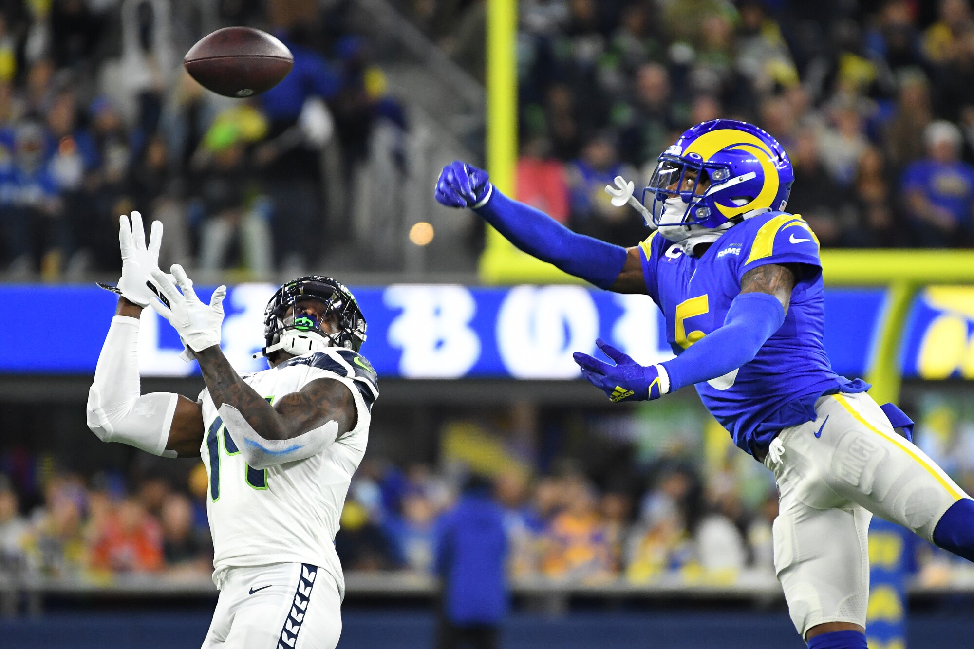 Rams cornerback Jalen Ramsey deflects a pass intended for Seahawks receiver DK Metcalf.