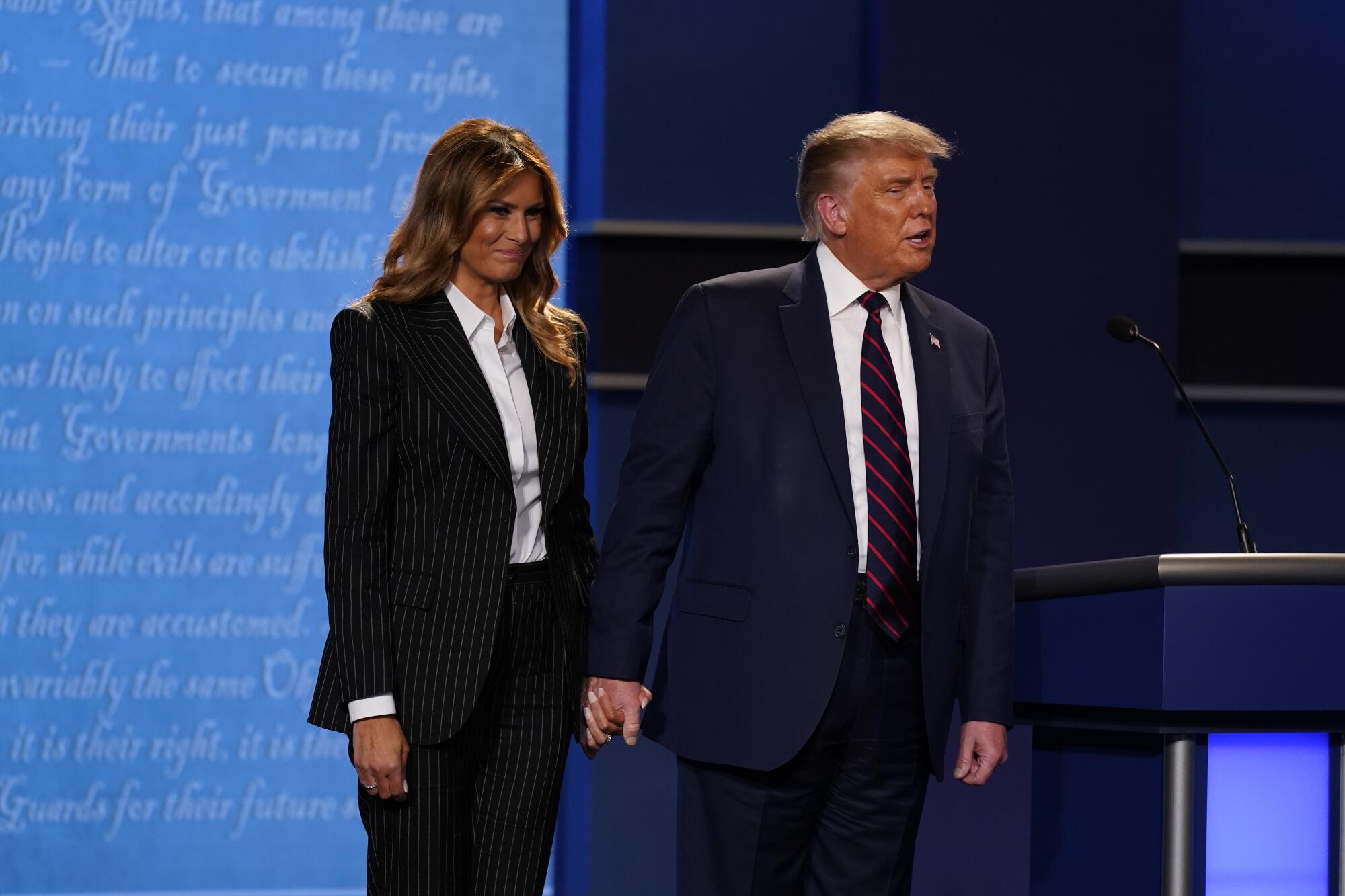 President Trump and First Lady Melania Trump on stage after the first presidential debate