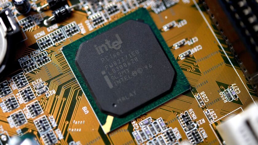 A close-up photo showing an Intel computer circuit board in 2018.