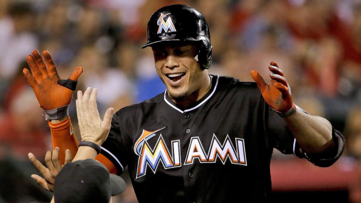 Miami Marlins outfielder Giancarlo Stanton celebrates after hitting a home run against the Angels in August.