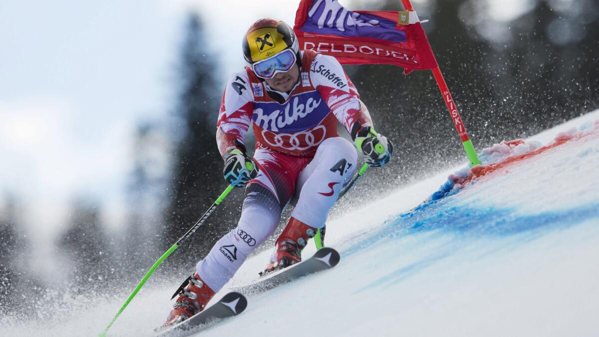 Marcel Hirscher clears a gate during his winning run in the men's giant slalom in Adelboden, Switzerland, on Saturday.