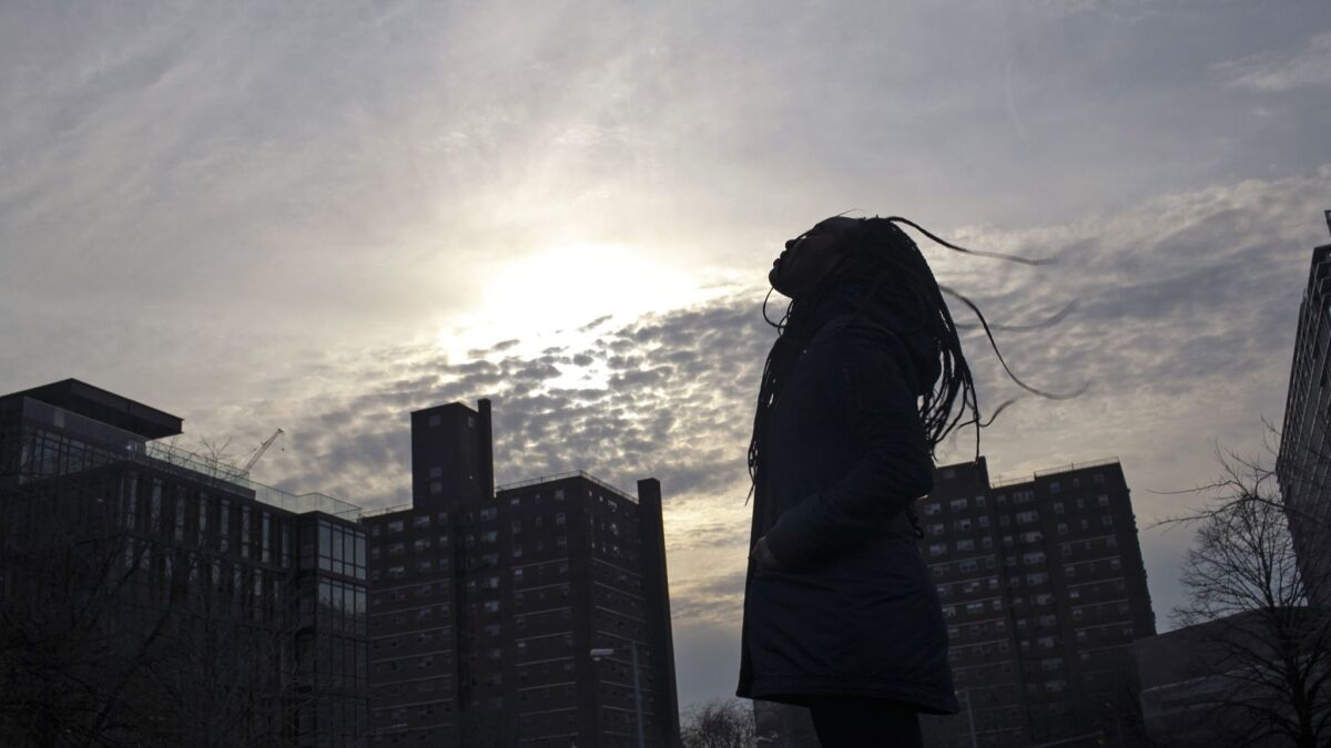 A survivor of sexual assault meditates in Brooklyn. The young woman found refuge in two trusted teachers, who sent her to Sisters in Strength, run by the nonprofit Girls for Gender Equity.