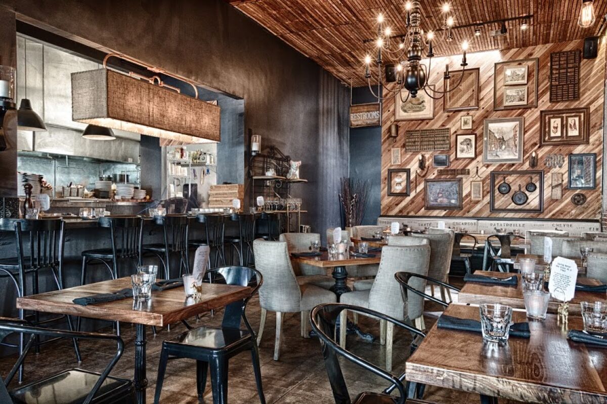 The warm and inviting dining room at North Park's The Smoking Goat is the perfect place to enjoy the change of seasons, San Diego style.