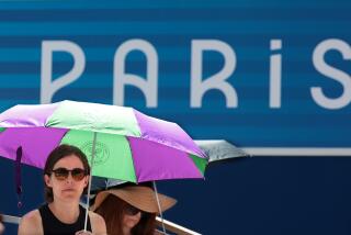 PARIS, FRANCE July 31, 2024-Fans try to stay cool at Roland Garros.