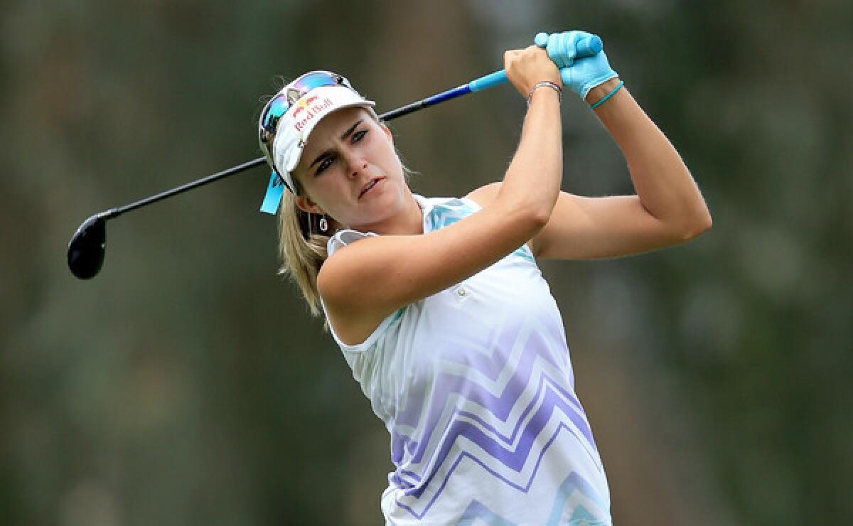 Lexi Thompson plays her second shot on the ninth hole during the second round of the Kraft Nabisco Championship at Mission Hills Country Club in Rancho Mirage on Friday.