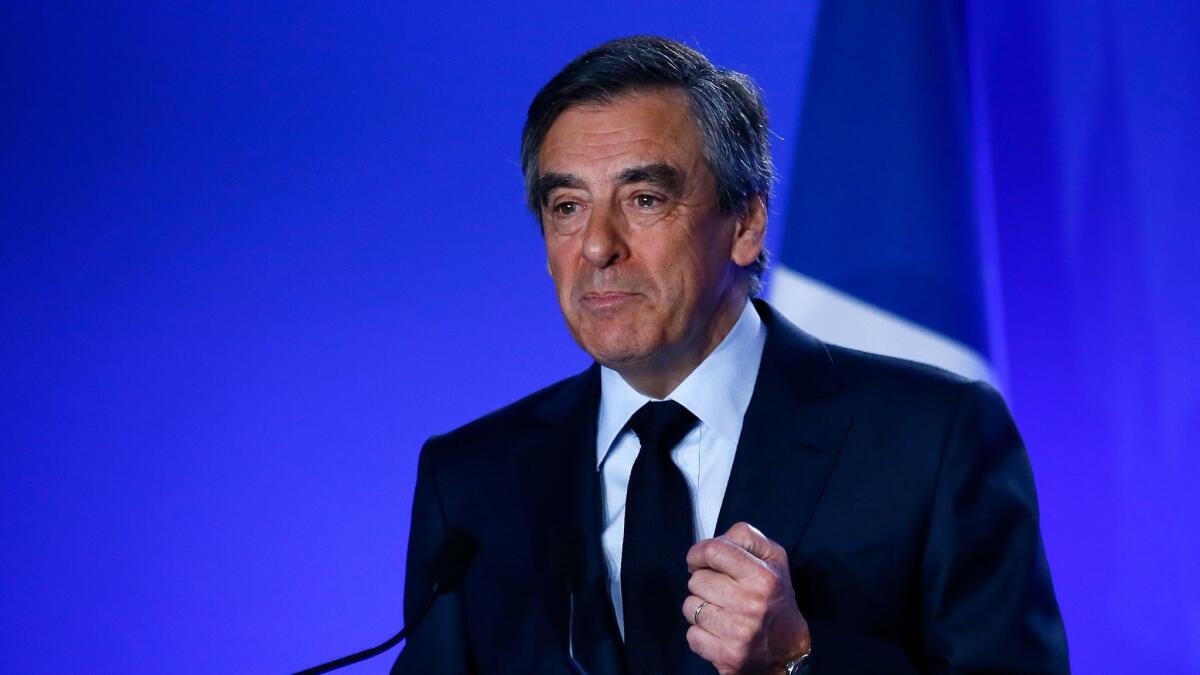 Conservative presidential candidate Francois Fillon delivers speaks at his campaign headquarters in Paris on Wednesday.