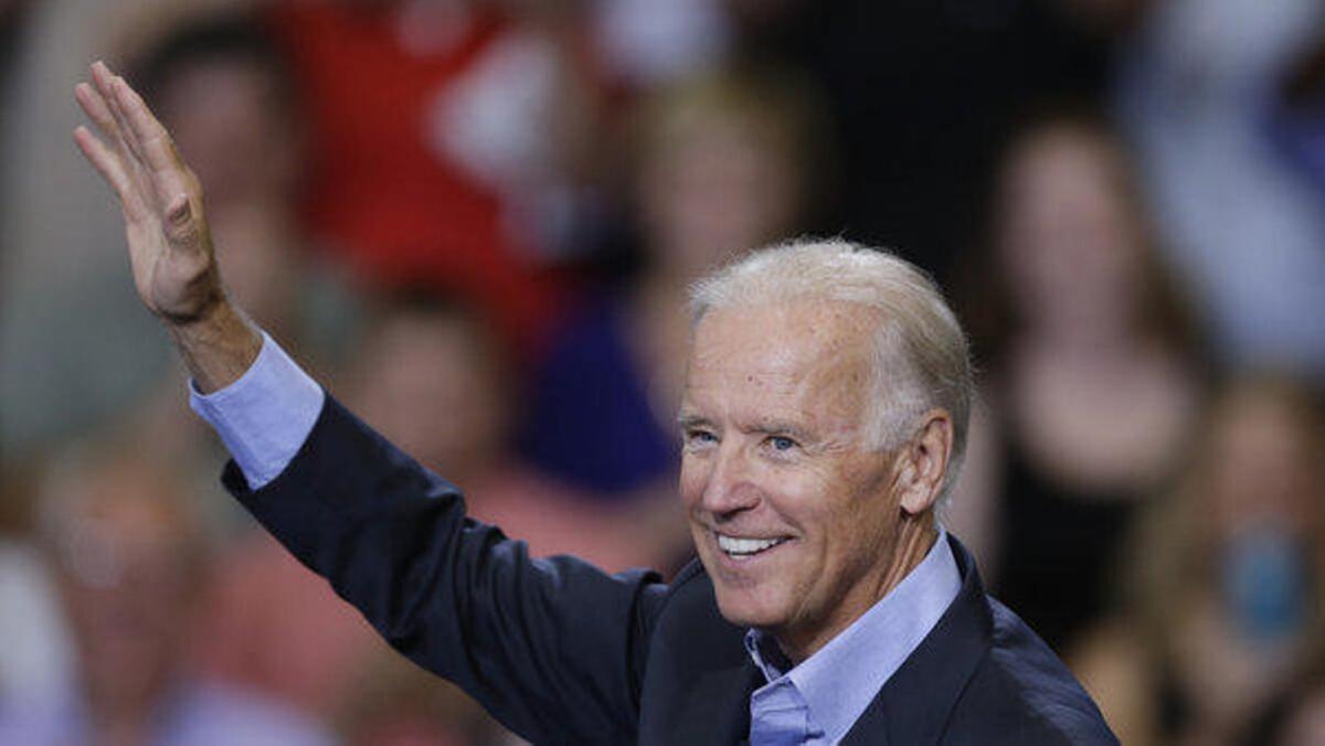 Vice President Joe Biden waves during a visit to Lackawanna College on Friday in Scranton, Pa.