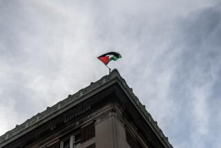 NEW YORK, NEW YORK - APRIL 30: A protester flies a Palestinian flag from on top of Hamilton Hall as part of a pro-Palestinian encampment on Columbia University campus on April 30, 2024 in New York City. Police arrested nearly 100 people as they cleared the university of demonstrators who were issued a notice to disband their encampment after negotiations failed to come to a resolution. University President Minouche Shafik has requested the NYPD maintain a presence on campus through at least May 17.(Photo by Stephanie Keith/Getty Images)
