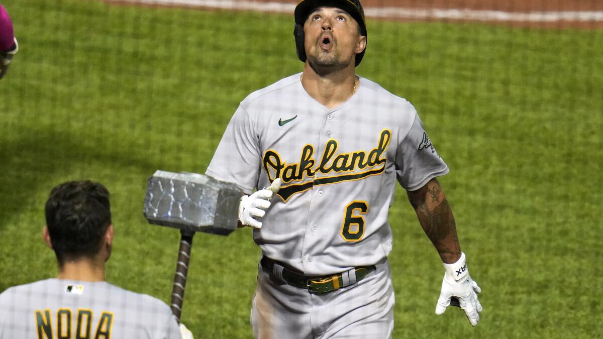 A's sock four homers, batter Pirates to end skid