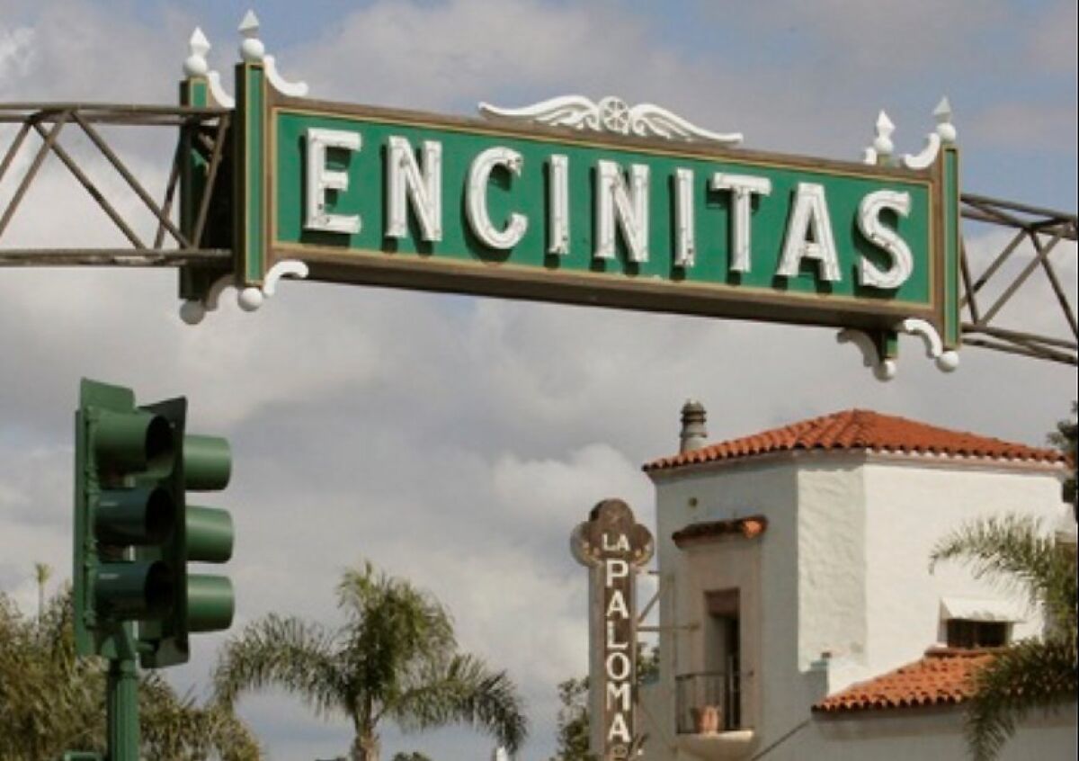 The Encinitas sign shines above South Coast Highway 101.