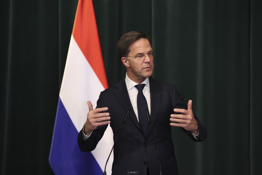 FILE - Netherlands' Prime Minister Mark Rutte speaks during a press conference after a meeting with his Albanian counterpart Edi Rama, in Tirana, Albania, Wednesday, Nov. 10, 2021. The Dutch government on Tuesday Dec. 14, 2021, ordered elementary schools to close a week early for Christmas holidays as authorities battle to rein in coronavirus infections amid concerns about the swift spread of the new omicron variant. (AP Photo/Franc Zhurda, File)