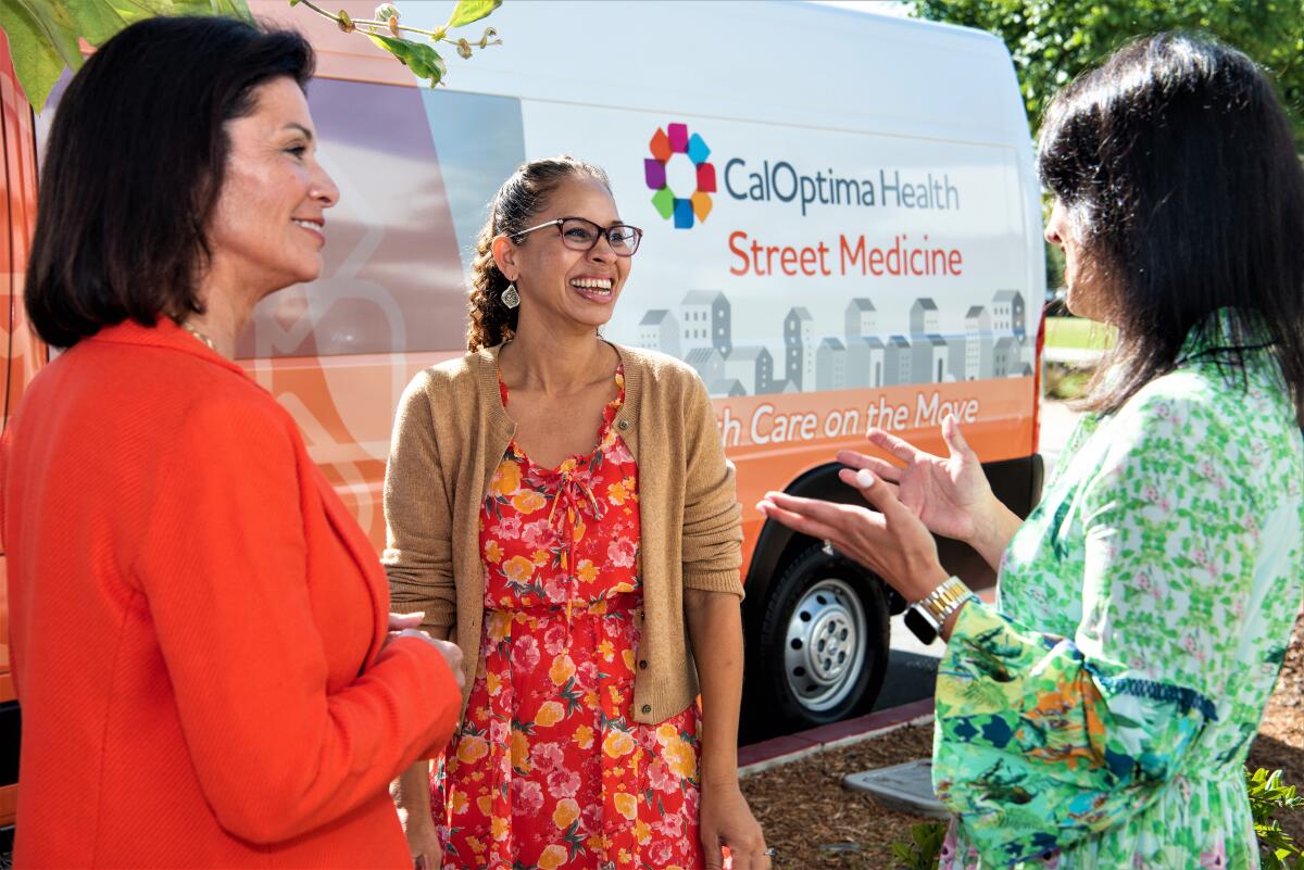 CalOptima's Kelly Bruno-Nelson, from left, Dr. Sabrina Cooley and Nicole Garcia at a news conference in Costa Mesa.