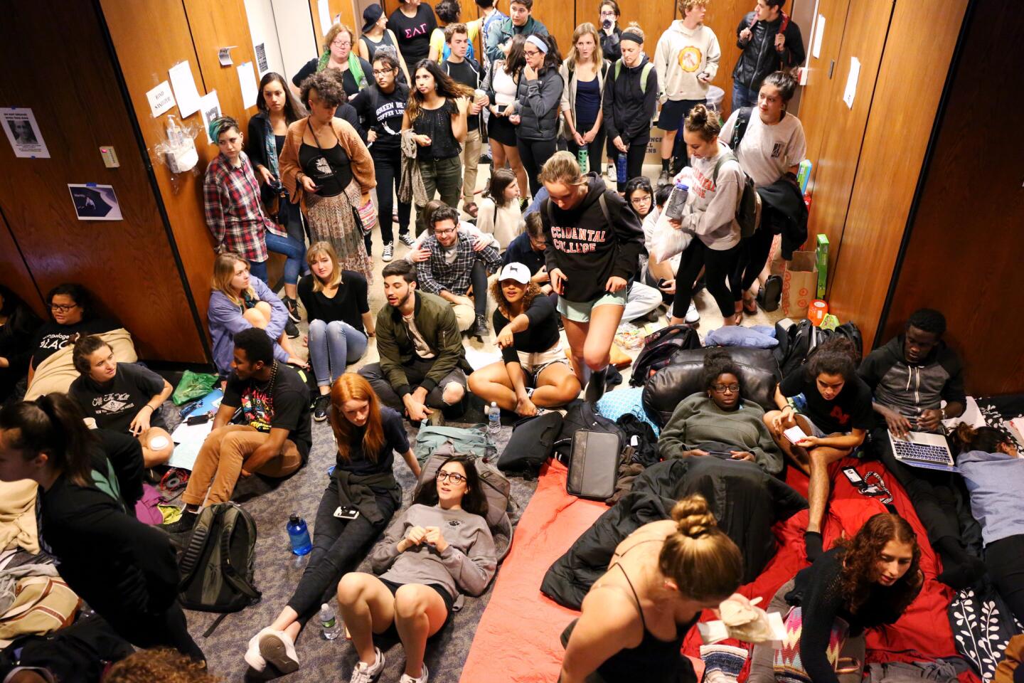 Occidental College students occupying Arthur G. Coons Hall gather for an online discussion with former students.