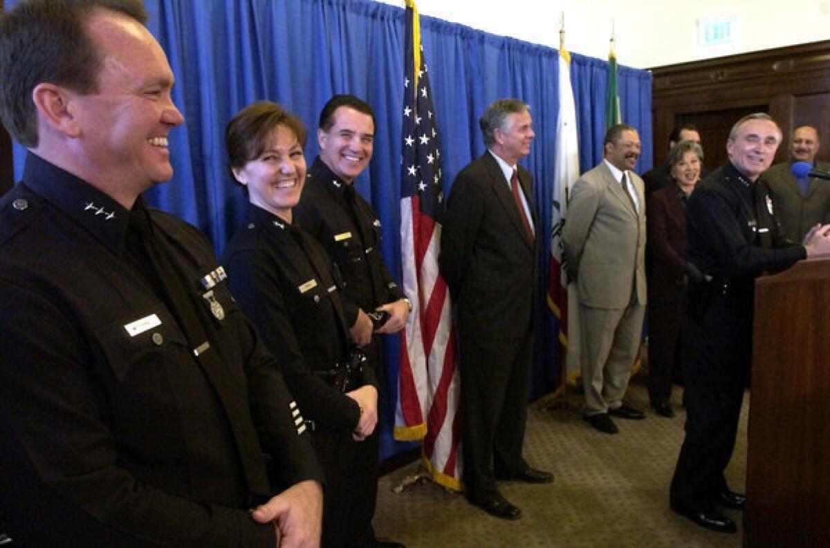 Hermosa Beach has selected LAPD Commander Sharon Papa as its new police chief. She is shown here, second from left, being promoted to deputy chief by former LAPD Chief Bill Bratton.