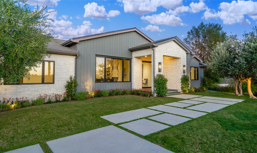 A home with a grassy front yard