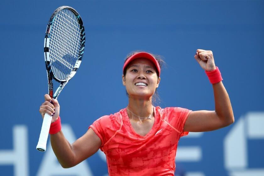 Li Na reacts after advancing to the U.S. Open semifinals.