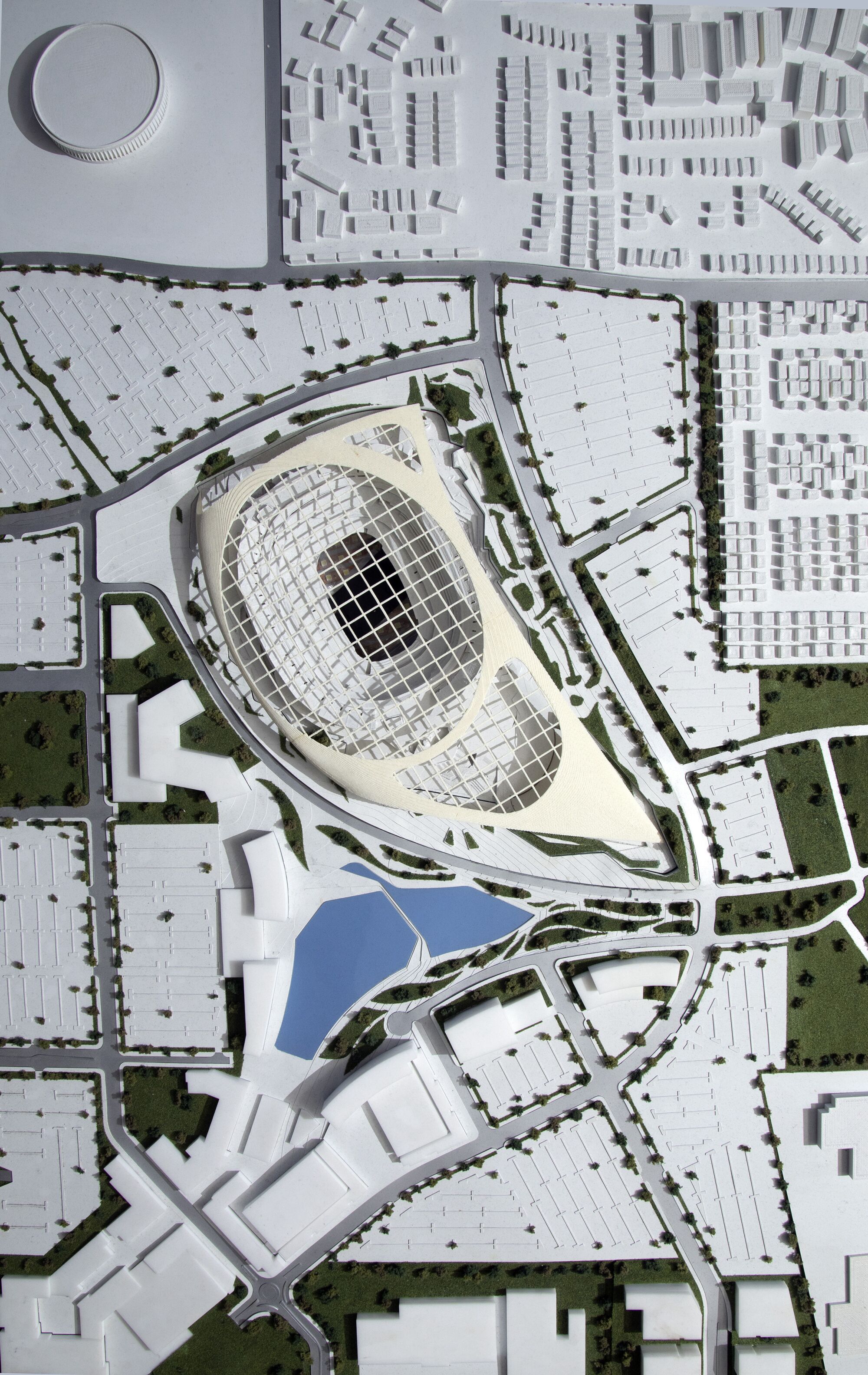 An overhead view of the model for SoFi Stadium also includes a model of the park and surrounding streets