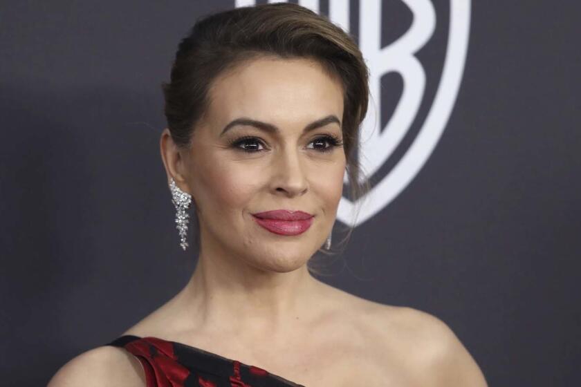FILE - In this Jan. 6, 2019 file photo, Alyssa Milano arrives at the InStyle and Warner Bros. Golden Globes afterparty at the Beverly Hilton Hotel in Beverly Hills, Calif. More than 40 Hollywood celebrities have signed a letter sent to Georgia Gov. Brian Kemp and House Speaker David Ralston saying they will urge TV and film production companies to abandon the state if a heartbeat abortion bill becomes law. The bill prohibits most abortions after six weeks from conception and could come to a House vote as early as Thursday, March 28. If approved, it will go to Kemp, whos expected to sign it. (Photo by Matt Sayles/Invision/AP, File)