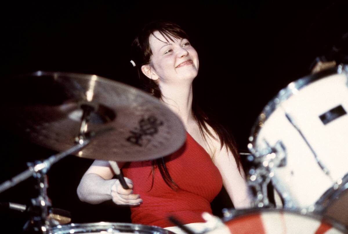 Meg White is shown here at a 2001 concert. Her minimalist drumming style has earned fans and detractors.