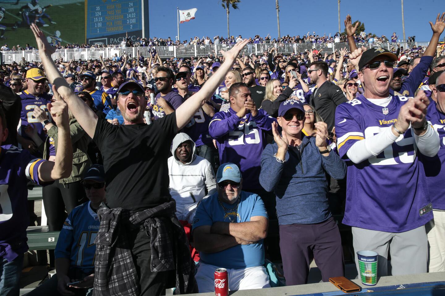 Vikings fans cheer after Minnesota defensive end Ifeadi Odenigbo scored on a fumble recovery.