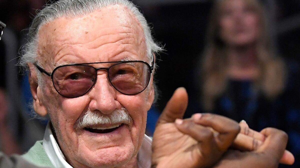In this Oct. 27, 2017, file photo, famed comic book creator Stan Lee appears at an NBA basketball game between the Los Angeles Lakers and the Toronto Raptors in Los Angeles.