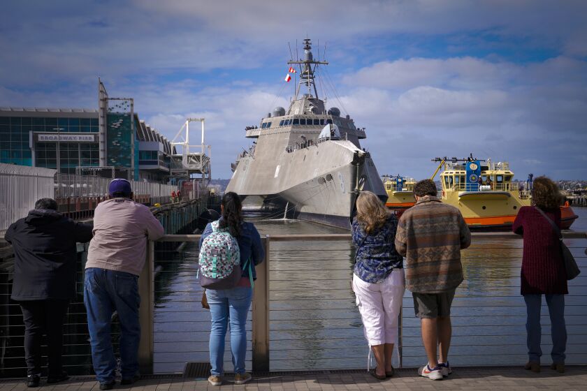 San Diego, CA - November 02: At Broadway pier on Wednesday, Nov. 2, 2022 in San Diego, CA., the USS Montgomery (Independence-class littoral combat ship) pulls up and prepares to tie-up on the north side of the pier. Sailors, Soldiers and Marines were setting up several static displays in preparation for Fleet Week in San Diego. (Nelvin C. Cepeda / The San Diego Union-Tribune)