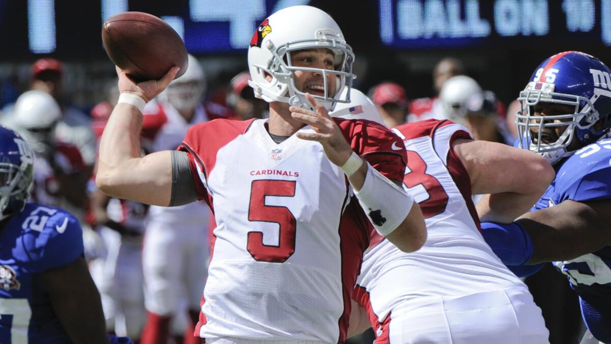 Arizona Cardinals quarterback Drew Stanton throws a pass during the first half of Sunday's win over the New York Giants. Stanton has overcome numerous setbacks in his journey to become an NFL starting quarterback.