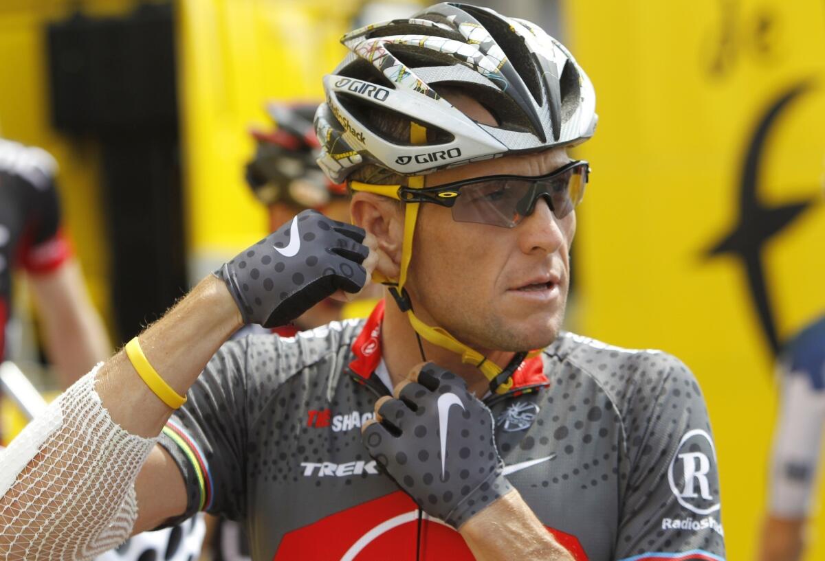 Lance Armstrong, shown wearing a yellow Livestrong wristband during the 2010 Tour de France, was forced from the foundation's board last year.