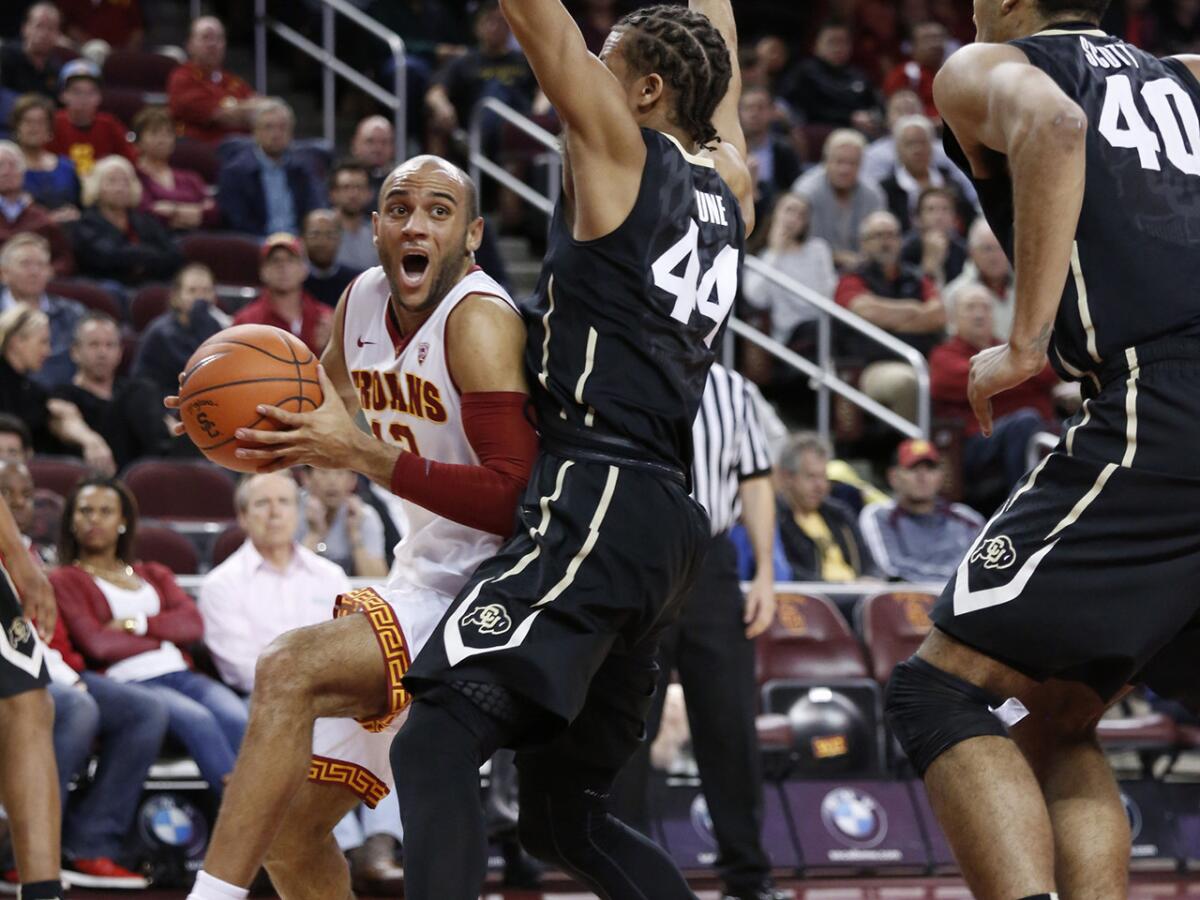 USC guard Julian Jacobs drives to the basket during the second half of the Trojans' 79-72 victory over the Colorado Buffaloes.