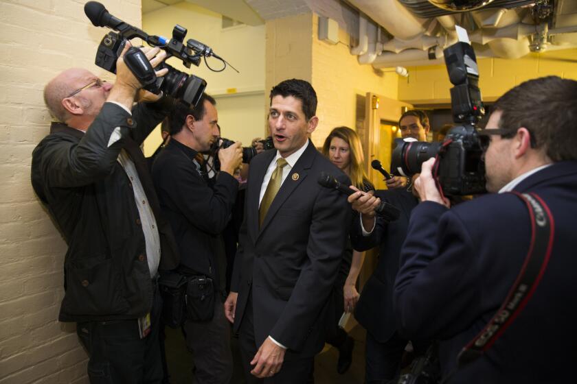 Rep. Paul Ryan, R-Wis., is surrounded by media as he arrives for a House GOP conference meeting in Capitol Hill on Oct. 21, 2015.