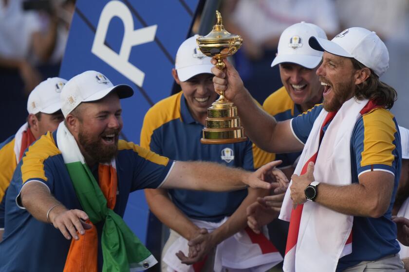 Europe's Tommy Fleetwood lifts the Ryder Cup after Europe won the trophy at the Marco Simone Golf Club in Guidonia Montecelio, Italy, Sunday, Oct. 1, 2023. (AP Photo/Andrew Medichini)