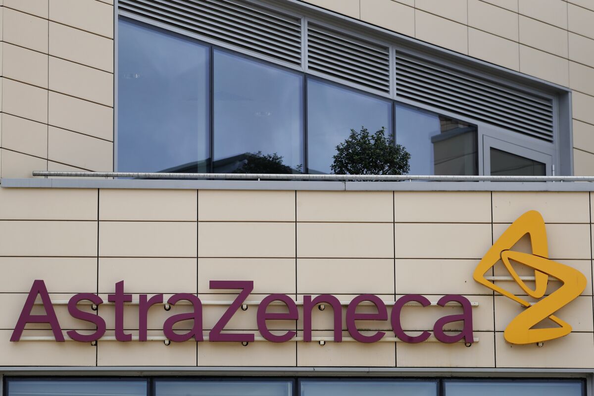 AstraZeneca's logo is seen on the outside of a building.