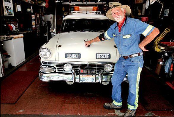 Thomas Weller, known as the San Diego Highwayman, poses for a photo at his home in El Cajon, Calif. Weller drives along area freeways and offers help to motorists in trouble. High gas prices, however, are forcing him to cut back his Good Samaritan runs to once every three days.