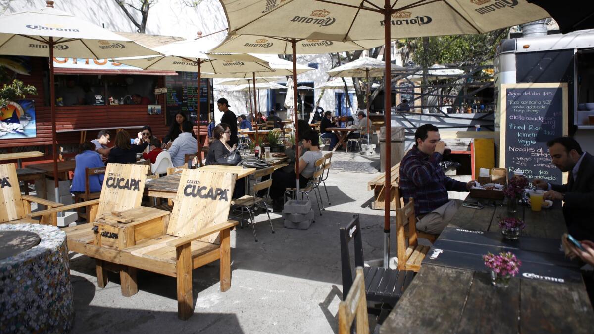 Telefonica Gastro Park in downtown Tijuana, with its large variety of culinary offerings, has been a popular destination for visitors, but business is down since the arrival of large groups of Central American migrants in Tijuana.