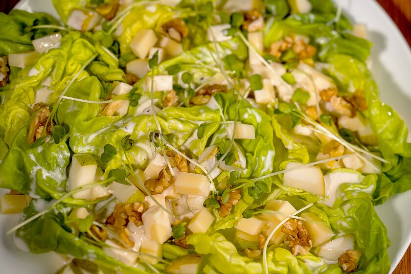 LOS ANGELES, CA - SEPTEMBER 29: A pear and Gruyere cheese salad, with butter lettuce, buttermilk dressing, sprouts and walnuts, made by L.A. Times Cooking Columnist Ben Mims, photographed in a home studio in Los Angeles, CA, Tuesday, Sept. 29, 2020. (Jay L. Clendenin / Los Angeles Times)