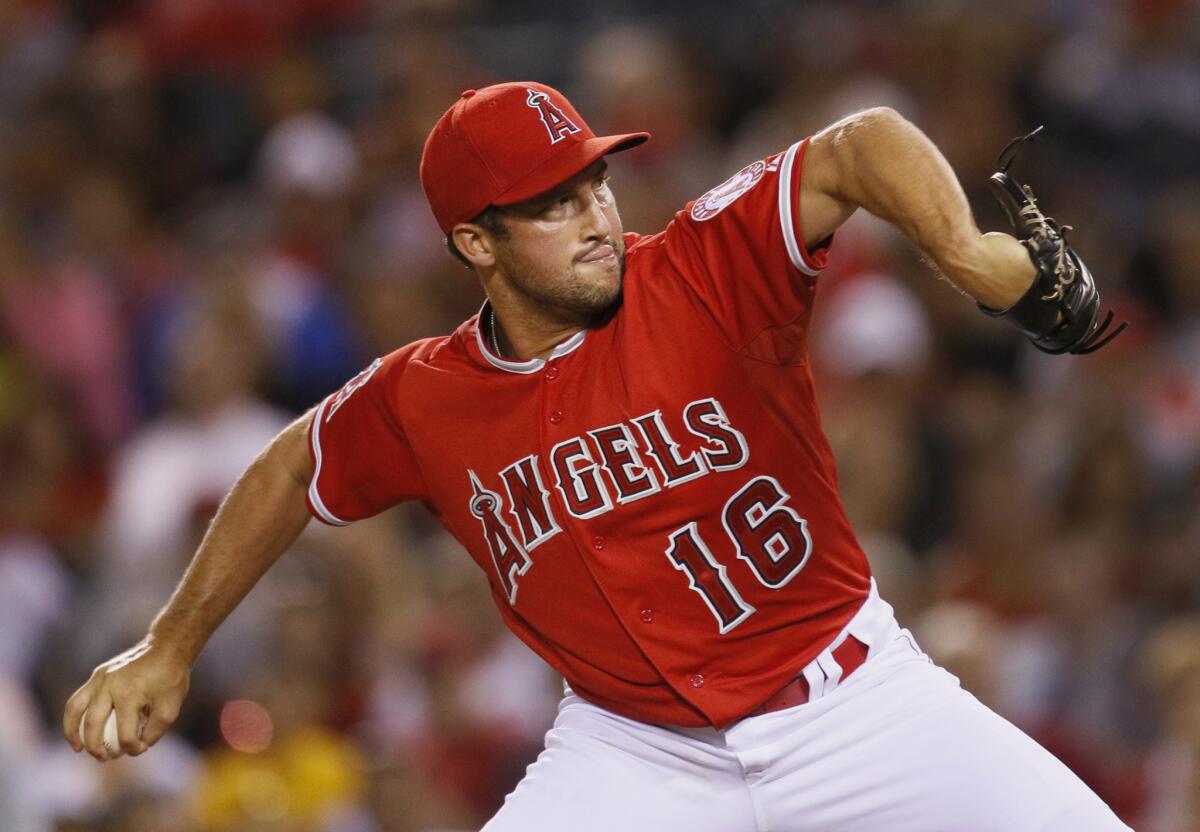 Angels relief pitcher Huston Street throws against the Seattle Mariners at Angel Stadium on July 19.