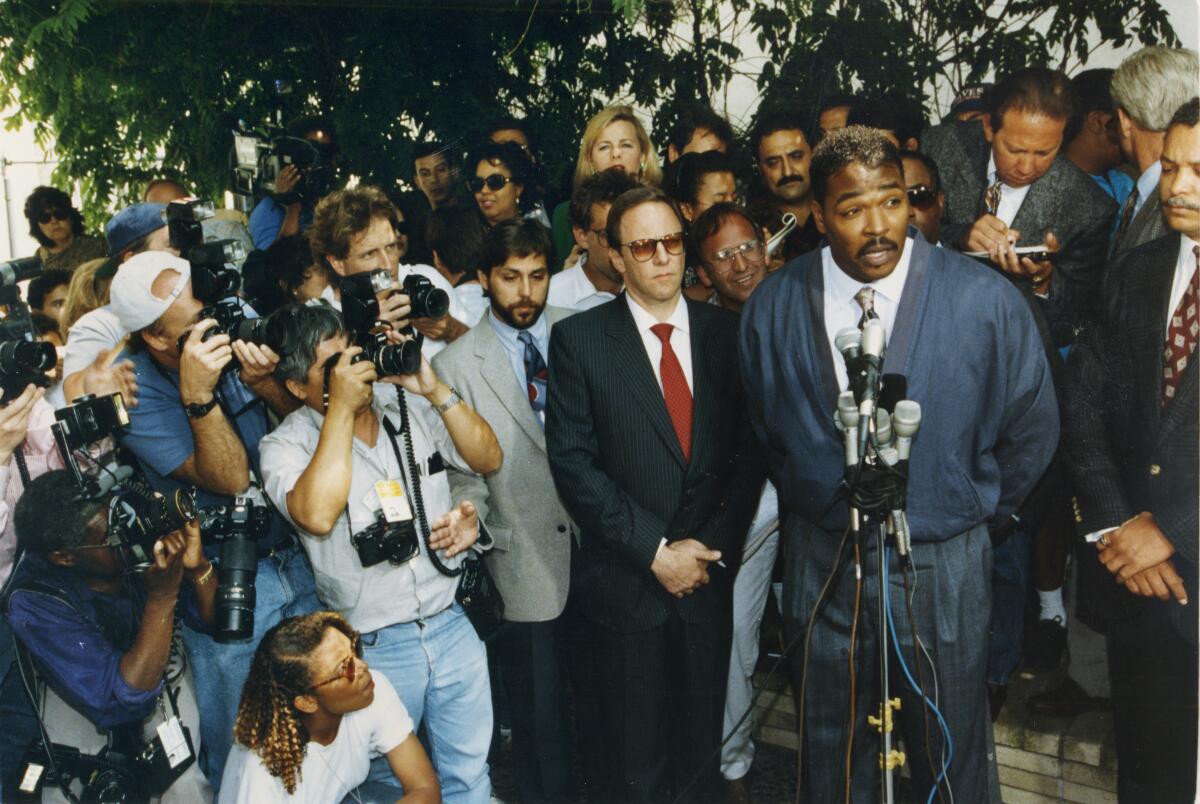 Rodney King speaks to the press on May 1, 1992, making a plea for the rioting to stop.