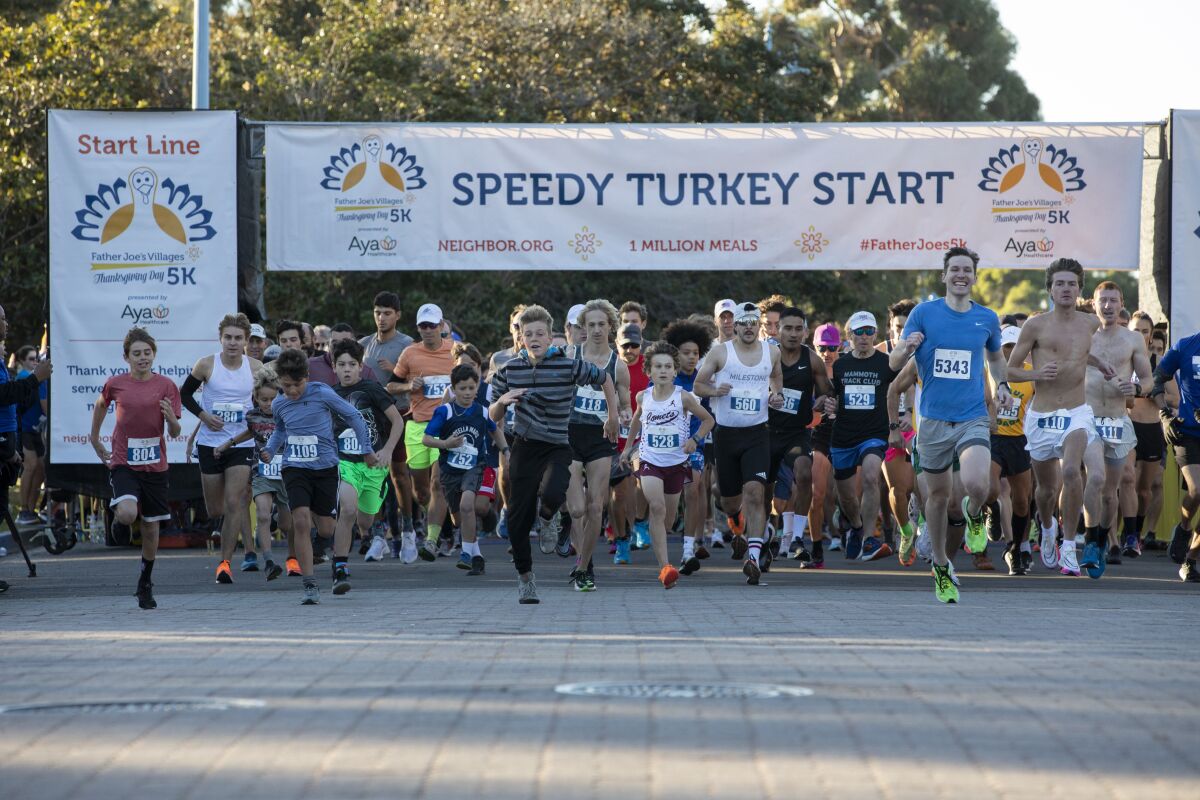  About seven thousand people participate in the 21st Father Joe's Villages annual Thanksgiving 5K Turkey Trot.