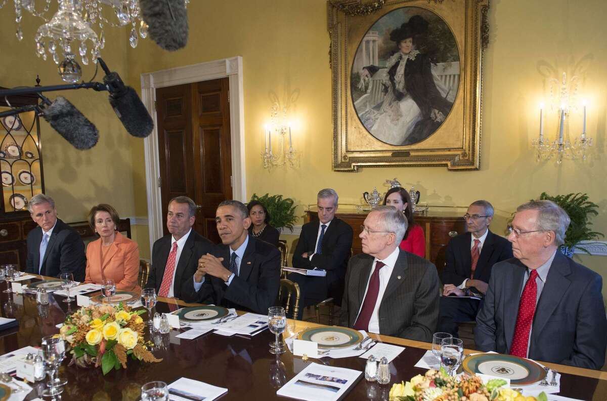 President Obama speaks during a lunch at the White House, surrounded by House Majority Leader Kevin McCarthy, House Minority Leader Nancy Pelosi, House Speaker John Boehner, Senate Majority Leader Harry Reid and Senate Minority Leader Mitch McConnell.