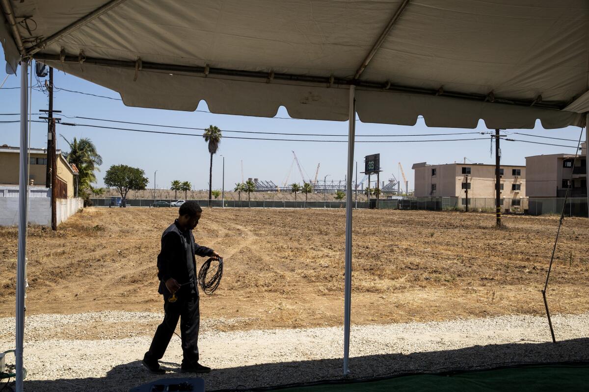 The dirt lot shown is where the proposed Clippers arena would be located in Inglewood.