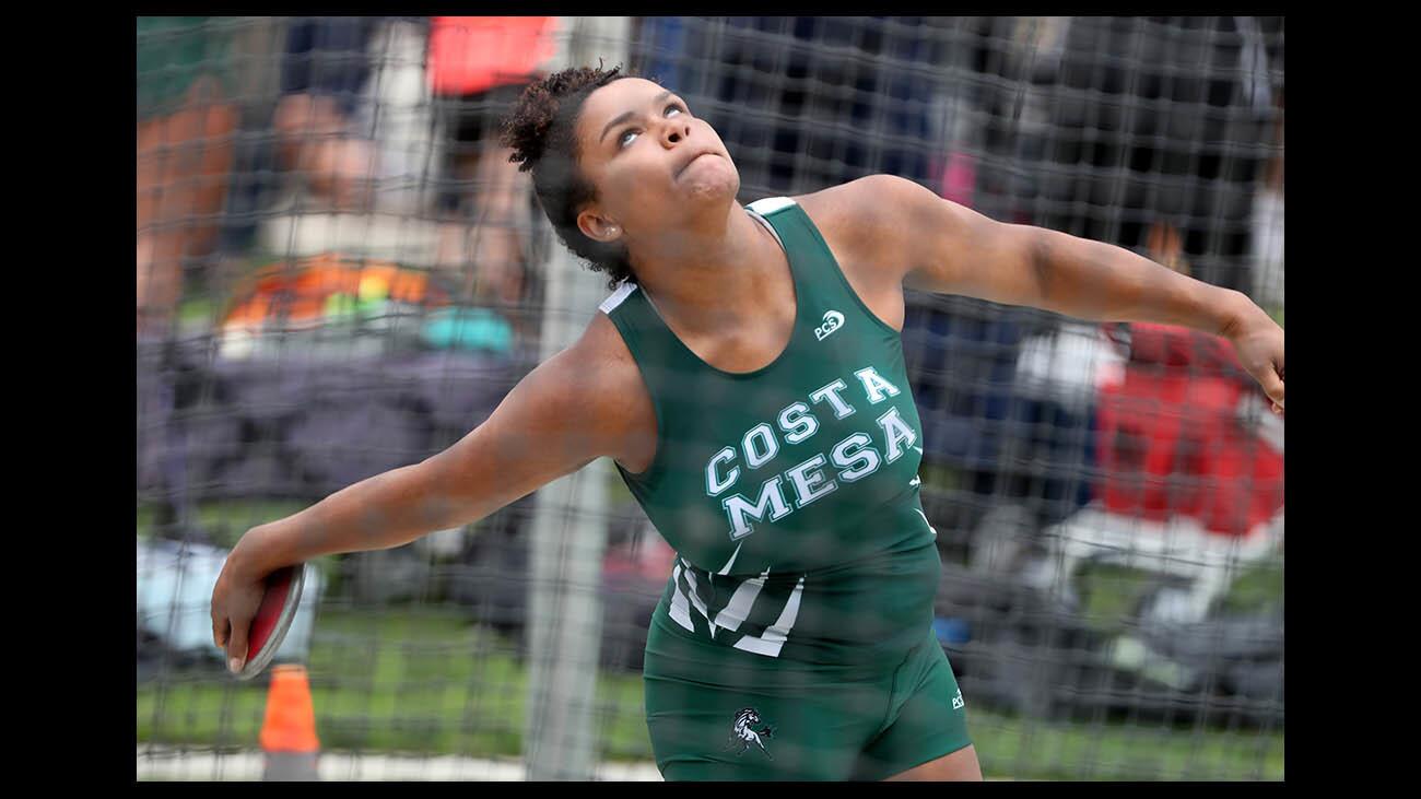 Costa Mesa High School discus thrower Tayla Crenshaw throws in CIF SS Track & Field Divisional Finals, at El Camino College in Torrance on Saturday, May 19, 2018.