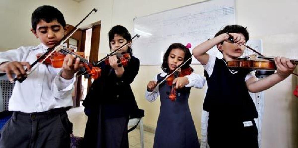 Students of the Baghdad School of Music and Ballet find a respite from the violence. But the tensions are never far away: Most leave their violins and flutes at school to avoid attracting the attention of religious militias by carrying instrument cases in the street.