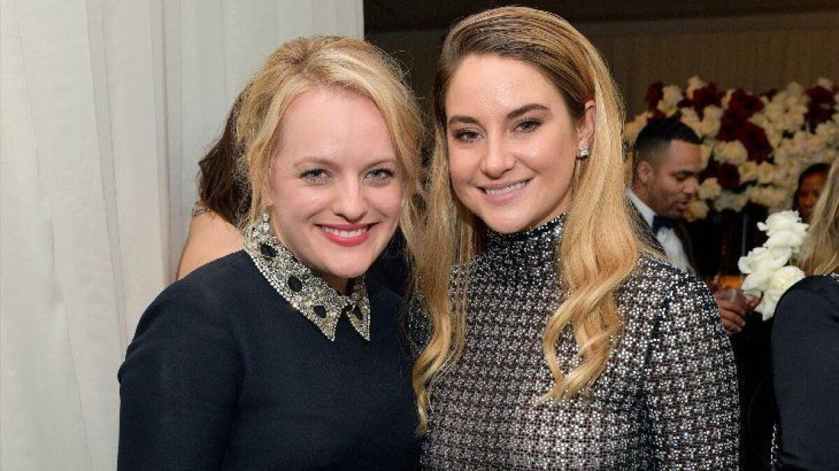 Actors Elisabeth Moss, left, and Shailene Woodley attend the InStyle and Warner Bros. after-party Sunday at the Beverly Hilton Hotel in Beverly Hills.